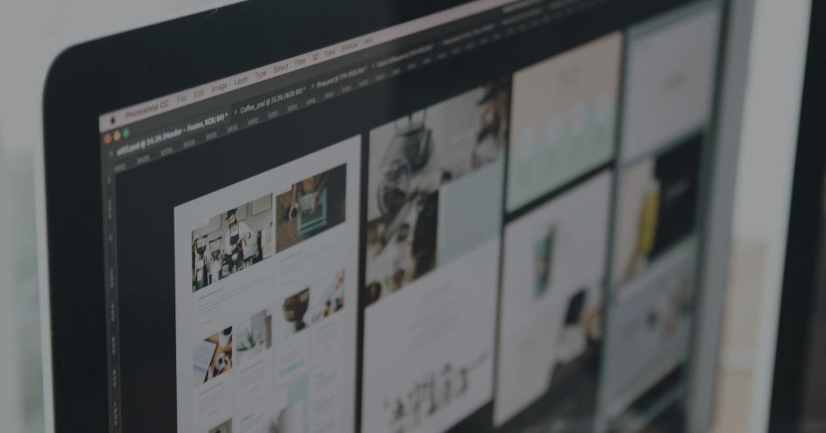 Freelancer and client discussing web development project in a consultation in office.